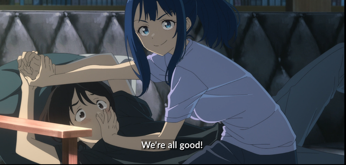 Yanami is holding down Nukumizu by his hands over his head, with her other hand over his mouth.  She is looking at the camera saying "We're all good!"