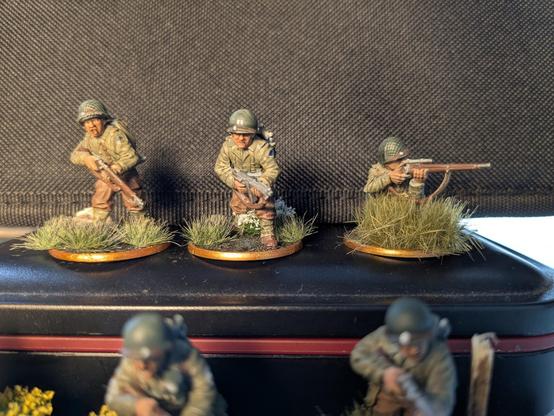 A set of painted bolt action miniatures, depicting WWII era US Rangers. They are painted to resemble the cast from the film' "Saving Private Ryan"