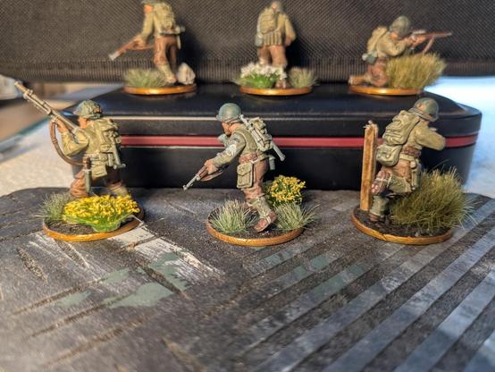 A set of painted bolt action miniatures, depicting WWII era US Rangers. They are painted to resemble the cast from the film' "Saving Private Ryan"