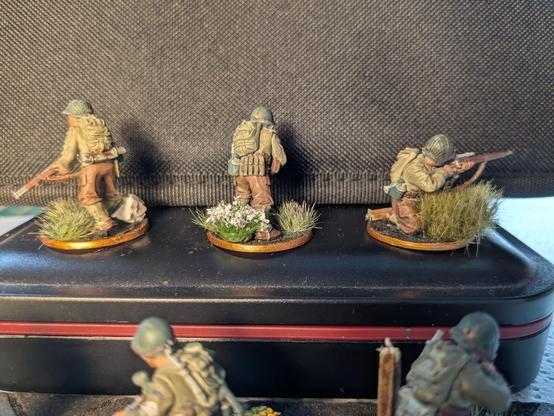 A set of painted bolt action miniatures, depicting WWII era US Rangers. They are painted to resemble the cast from the film' "Saving Private Ryan"