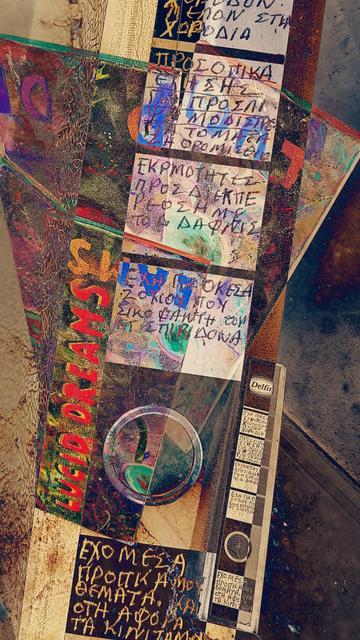 The three canvases and the dossier on the side of the street. I placed a second layer, the spine with the writings on top of the original photo. And I used some filters. So now there's an image separated by diagonal zones, rectangulars with badly written messages (the spine), and a loud red "lucid dreams" clearly visible in the mess.