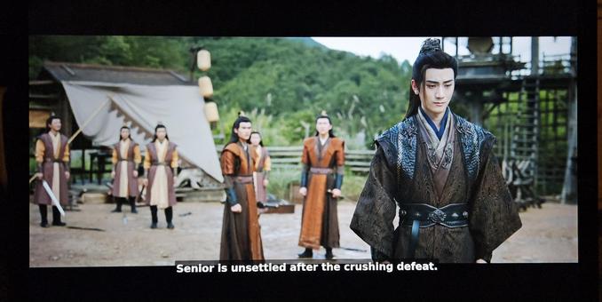 Deflated xianxia officer in the foreground, underlings in the background where one of them is saying "Senior is unsettled after the crushing defeat."