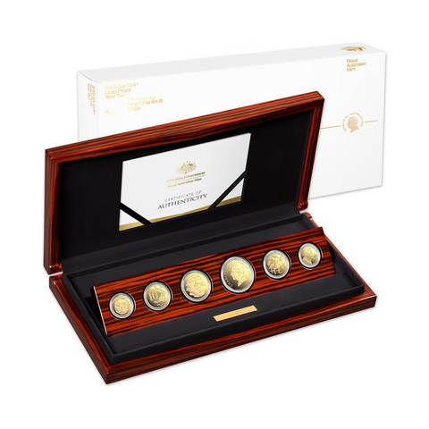 2025 Australia gold proof coin set with the coins across one row in a wooden box.