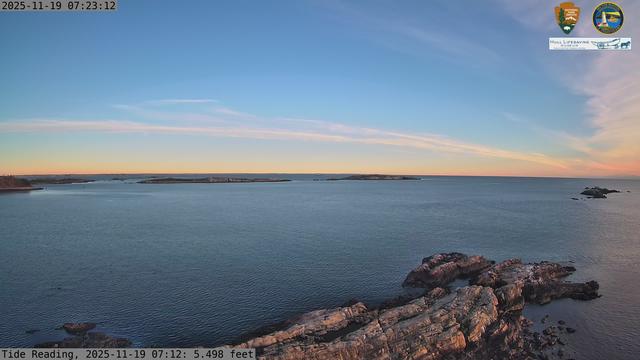 Camera looking north from Boston Light on Little Brewster Island. View looks toward the northern approaches into Boston Harbor, with Graves Light visible into the distance. The smaller Brewster Islands, Middle and Outer, are in the midground, with the Shag Rocks on the near right.