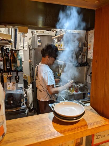 Small place person cooking gyoza