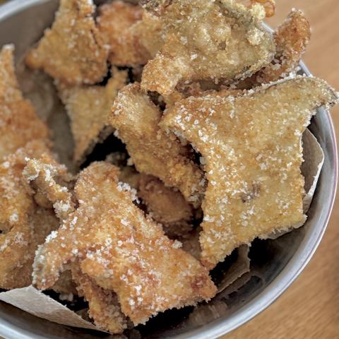 The finished mushroom schnitzels in a bowl.