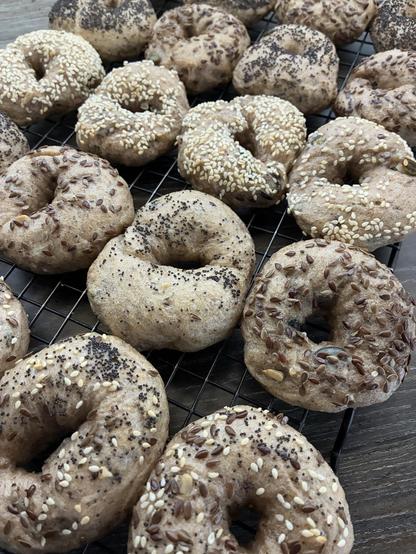 Sourdough bagels topped with sesame seeds, poppy seeds and linseed.