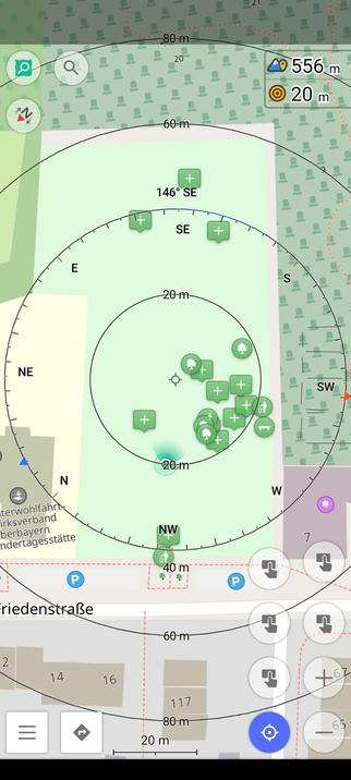 OsmAnd base layer with nodes or notes depicting micro mapping a playground. There are 20 notes/nodes with the nodes being trees, benches, or waste baskets. The notes being playground equipment or barriers.