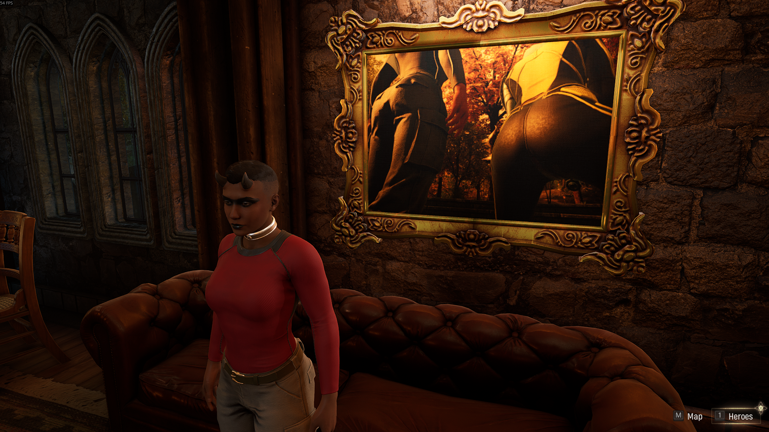 A screenshot from Midnight Suns wherein my character is standing in front of a painting of her and another character's asses.