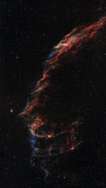 A stunning image of a nebula in space, showcasing vibrant hues of red and blue against a backdrop of countless stars. The nebula appears wispy and ethereal, highlighting intricate details and structures.
Oszałamiający obraz mgławicy w kosmosie, prezentujący żywe odcienie czerwieni i błękitu na tle niezliczonych gwiazd. Mgławica wydaje się wątła i eteryczna, podkreślając skomplikowane szczegóły i struktury.
