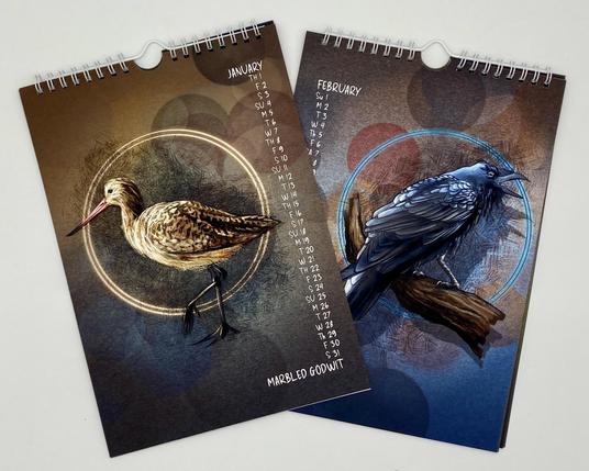 Product photograph of two pages from a flip-top wire bound calendar, one featuring a Marbled Godwit, and the second featuring a Raven.