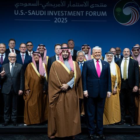 President Trump posing next to Crown Prince Mohammed bin Salman of Saudi Arabia for a group photo at the U.S.-Saudi Investment Forum at the Kennedy Center in Washington.