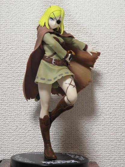 The whole body of a young female warrior with blonde hair and dirty brown cloak, raising her left leg slightly and just pulling the sword out of the sheath.