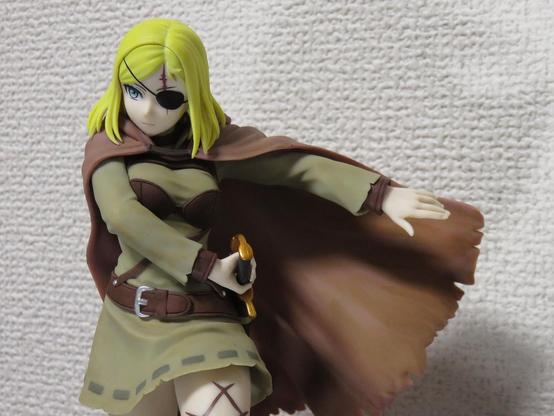 Upper body.
She wears a black eyepatch over her left eye.