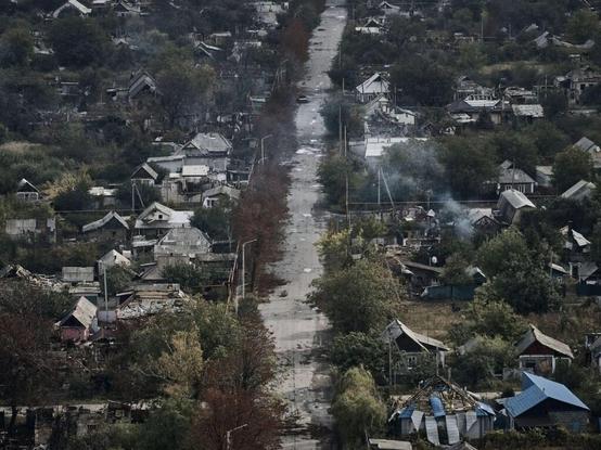 A general aerial view shows the destroyed city covered in morning fog, following months of intense fighting near the front line, fall 2025 in Pokrovsk, Ukraine