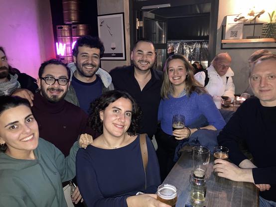 Socializing at the pub after the talks