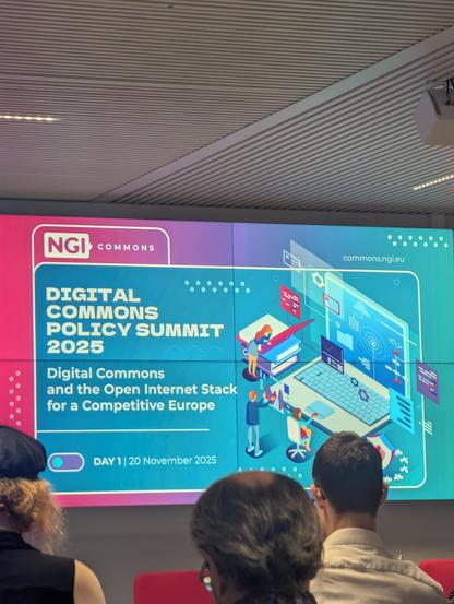 A photo of the presentation slide of the digital commons policy summit.