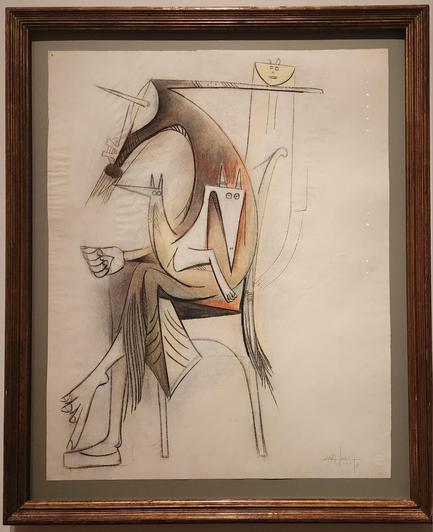 Charcoal and pastel.Seated human-like figure in a black robe with two dog-like creatures in its lap. The head of the seated figure is shaped like a hammer.