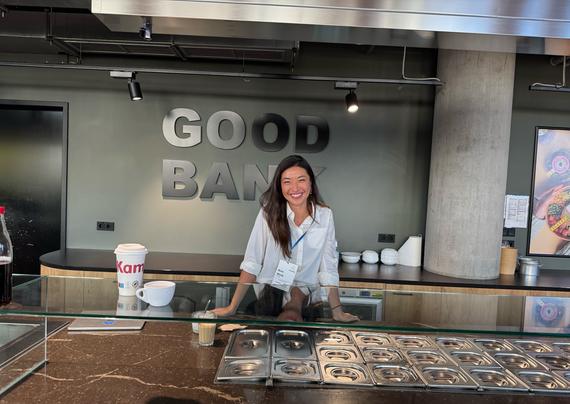 Rose behind a food counter
