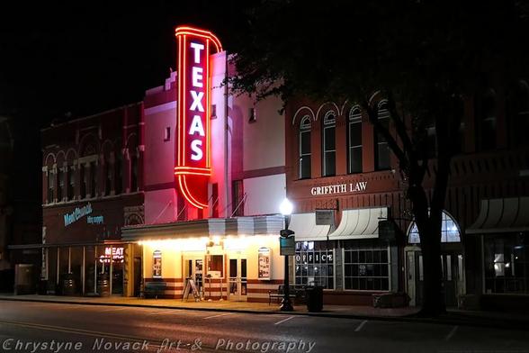 --Discount details after following description--A vibrant neon sign spelling out "Texas" dominates the night, standing tall above a quiet street lined with brick buildings. The soft glow from street lamps and storefronts casts a warm light on the paved road, accentuating the stillness of the nocturnal townscape. The Texas Theater in historic Waxahachie is a two-story theater that opened in 1895. The fully restored theater with its new large neon sign hosts live music, movies, small plays, and stand-up comedy.

We are all feeling the pinch these days, as times are tight and prices climb. I’m taking 25% off my markup to make it a little easier to give the gift of art this holiday season. ----------> Code: HGHSYP for 25% off - good til Dec. 10, 2025 . In addition, Nov 22 & 23rd all U.S. orders get free ground shipping.