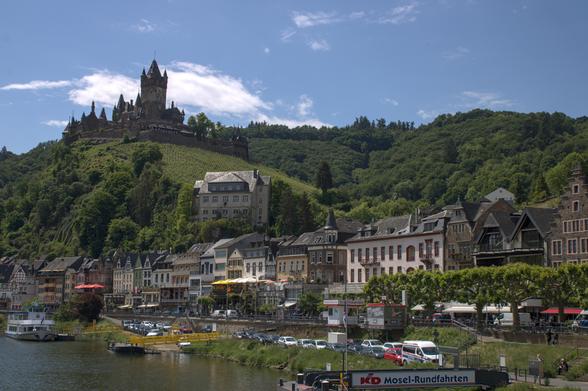 Landscape of a castle by a river.