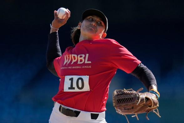 Kelsie Whitmore, the No. 1 overall pick in the WPBL draft, pitches during tryouts for the Women’s Professional Baseball League in August.