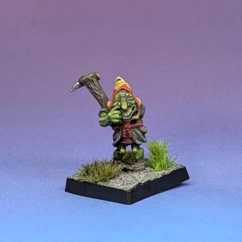 Goblin with club picking his schnoz