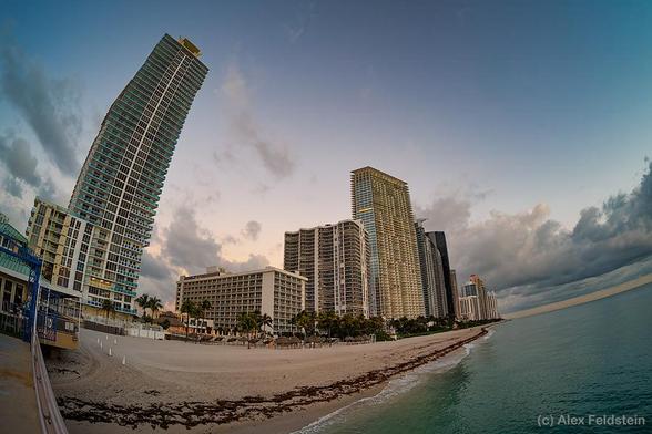Sunny Isles Beach with a fisheye, sky and ocean on an early morning