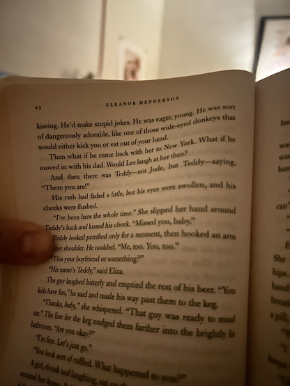 A (dimly lit) photo of page 42 of Ten Thousand Saints by Eleanor Henderson