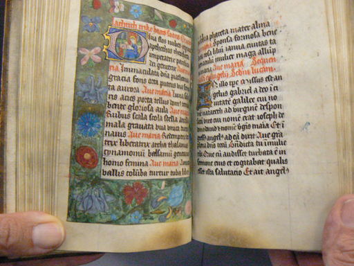 Finger marks where the book was held open close to the spine.
Incipit of a prayer to the Seventy-two Names of the Virgin (fols. 67v-68r), held open at corners. From Brussels, Koninklijke Bibliotheek Albert I, Ms. 15078