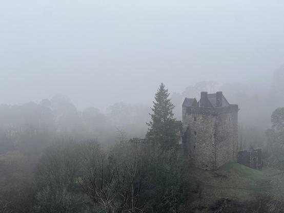 Castle Campbell brooding in the mist.