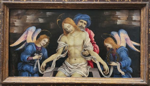 Miniature oil on panel of the dead christ at center, supported in a seated position by Nicodemus, who looks directly at the viewer from behind Christ's head. On each side is an angel apparently preparing to wrap the body in cloth. the background is black with some white and brown texturing, and the angels' blue robes and Nicodemus' blue hat and red robes are rendered in dark but vibrant colors.