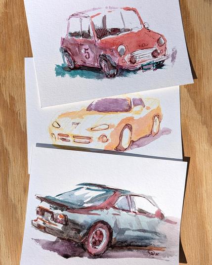 First photo shows the final sketches of three cars: a Mini Cooper, Dodge Viper, and a Porsche 944