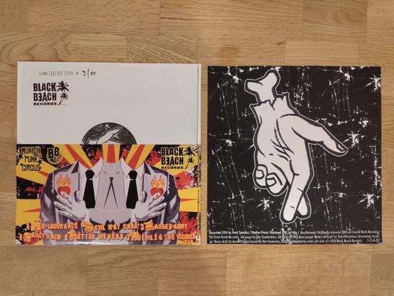 left side:
 Cover back,
 Gumbabies - Another raged army 10”
  2 suites with burning hearts
all the titles of the 10" , and the
right side: inlay with all the band members and names of the labels munich punk circus and black beach records
this is only half of the front cover.
you can see the 10” inner sleeve , which has the label name and written limited edition 9/10

right side: the Gumbabies hand on a skull, back of the inlay