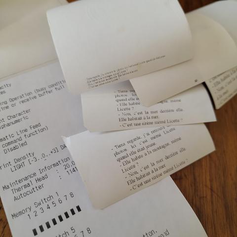 Différents essais d'impression sur ticket de caisse.