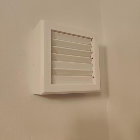 A 3d printed cover for the same fan with horizontal vanes that are pulled open by air pressure when the fan runs and close when airflow stops