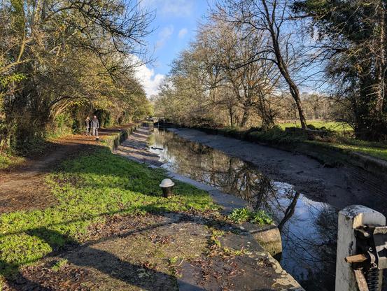 A small pond (maybe 150 meters long) on a call between 2 locks almost completely emptied of water.