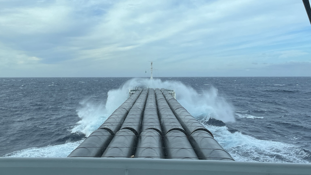 Ship steaming through rough sea. Seen from ships bridge.
