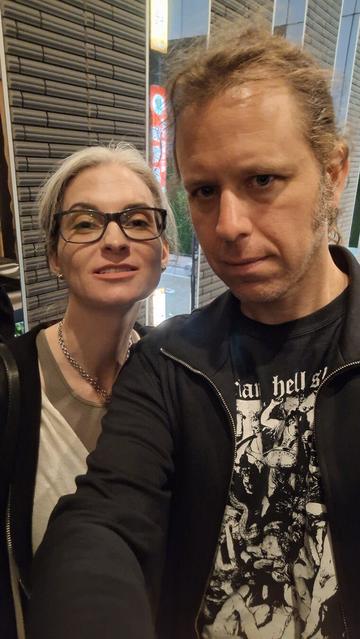 Katherine and Duane take a group selfie. 🙃