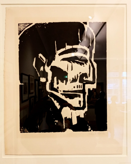 Holzschnitt 
Ein Männerkopf von der Seite mit einem ausgemergelten Gesicht. Es ist in ganz groben Zügen gezeichnet, aber sehr ausdrucksvoll