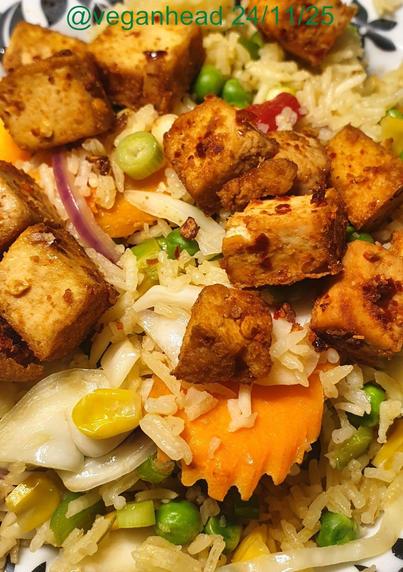 Vegetable fried rice: basmati rice, red onion, carrot, courgette, white cabbage, red pepper, green pepper, sprig onion, fresh ginger & garlic, rice vinegar, soy sauce.

Spicy Marinated Dry-fried Tofu: marinated in soy sauce, 'fish' sauce, kimchi chilli mix.