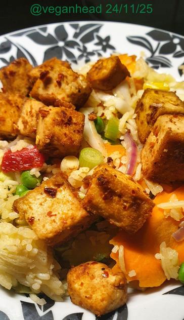 Vegetable fried rice: basmati rice, red onion, carrot, courgette, white cabbage, red pepper, green pepper, sprig onion, fresh ginger & garlic, rice vinegar, soy sauce.

Spicy Marinated Dry-fried Tofu: marinated in soy sauce, 'fish' sauce, kimchi chilli mix.