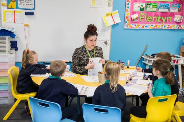 Teacher in a Primary School classroom