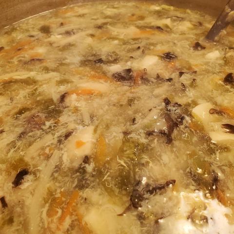 Homemade, Chinese hot and sour soup in a large stock pot.