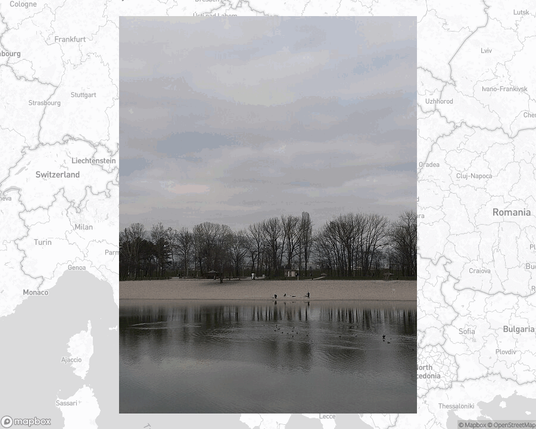 A photo of or from a park from the linked website, overlaid on a cropped world map where it's located.