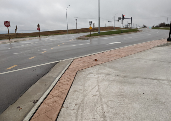 Where it was, unclear how a driver going the right way could have broken it in that direction.