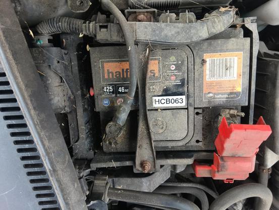 Old 063 battery in Ford Fiesta, harness for ECU is at the side of it