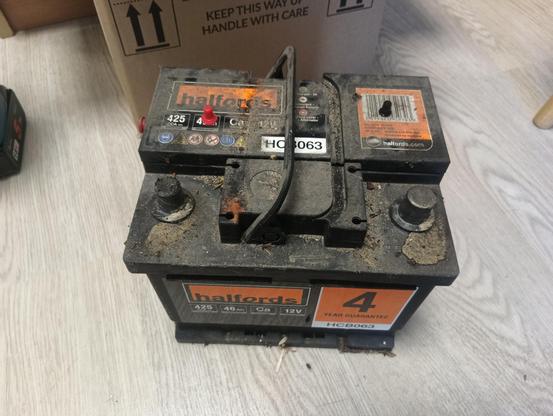 The old battery hauled out, whoever installed it hadn't even removed the transport bungs!