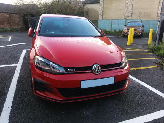 2018 Golf GTI parked in 1970s era open car park run by the Council (I had to walk further to the optician from here, but its cheaper than the private one and the spaces are wider)