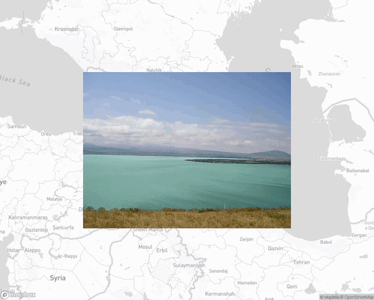 A photo of or from a national park from the linked website, overlaid on a cropped world map where it's located.